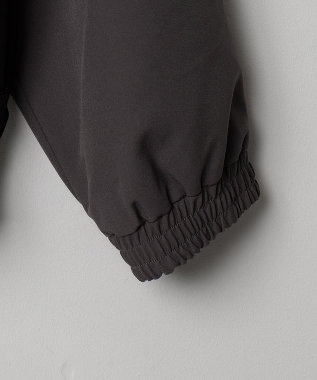 トロミスタンドブルゾン