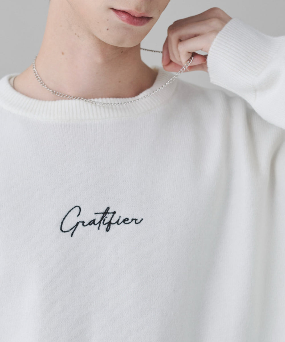 アクセ付きワンポイントニットプルオーバー