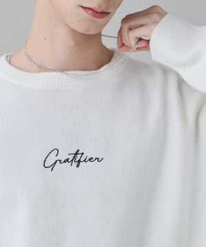 アクセ付きワンポイントニットプルオーバー