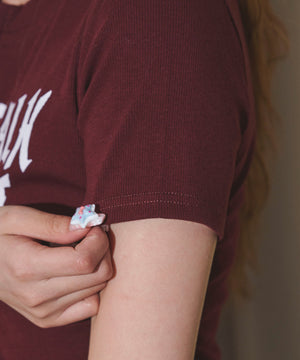 グラフィックロゴWジップSSトップス