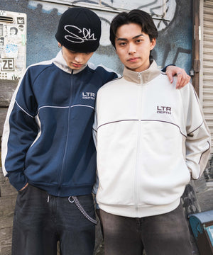 パイピングトラックジャケット