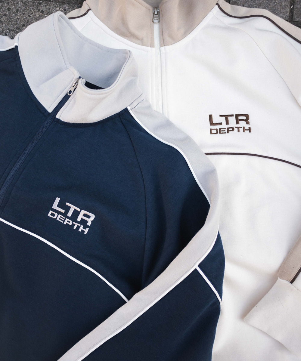 パイピングトラックジャケット