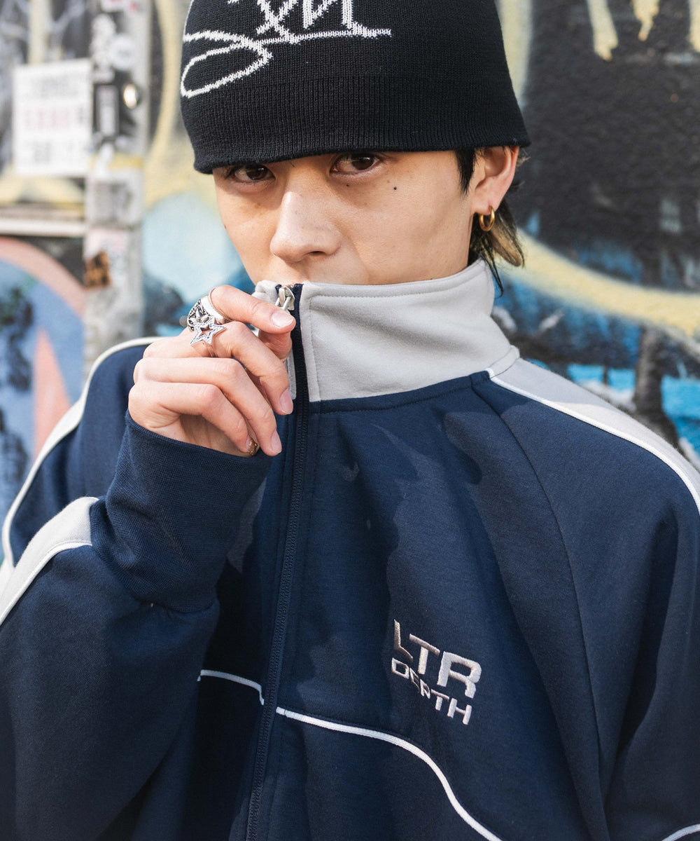 パイピングトラックジャケット