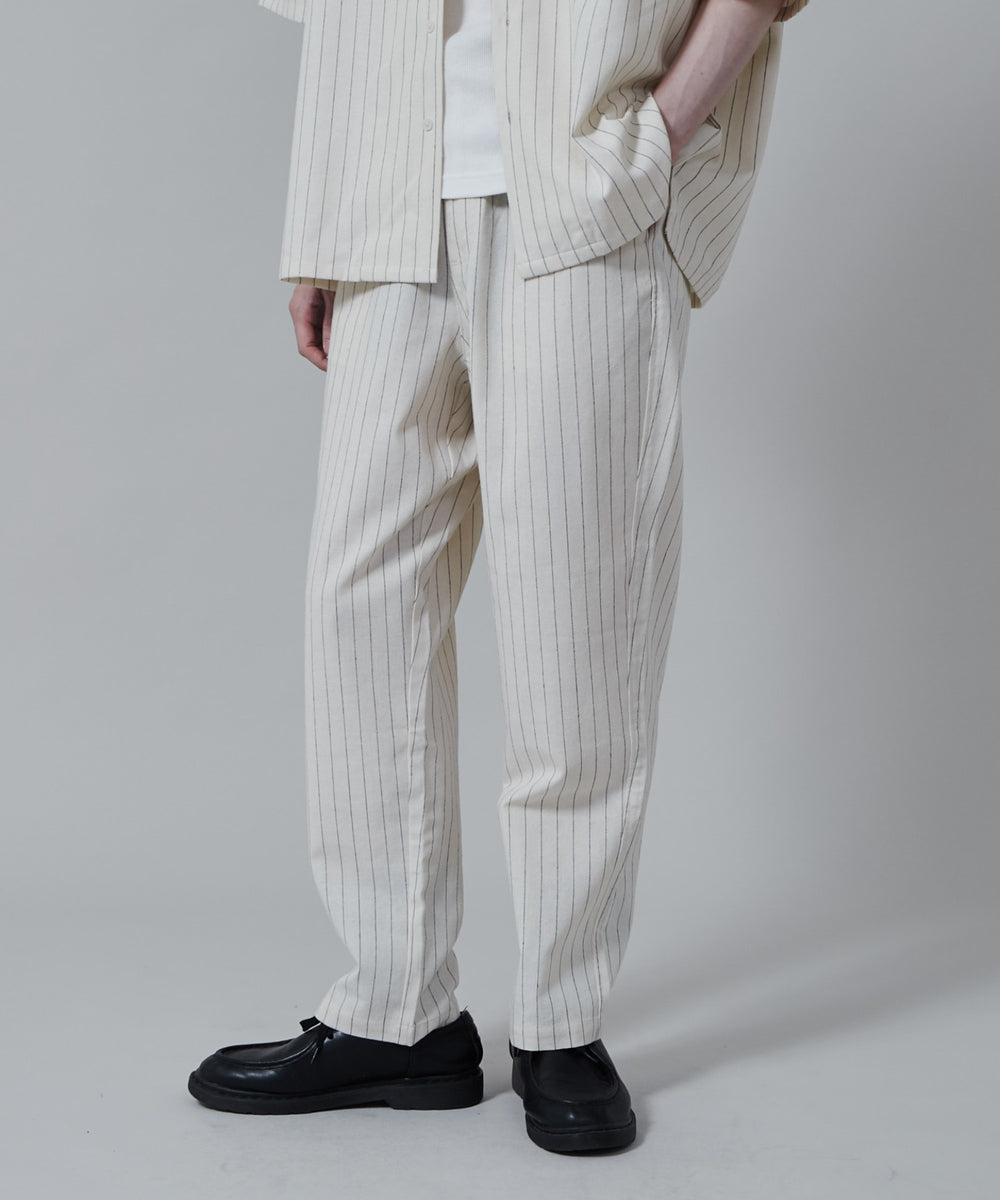 オフホワイト モデル：180cm L着用