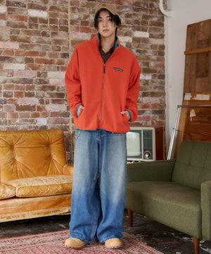 オレンジ モデル：175cm L着用