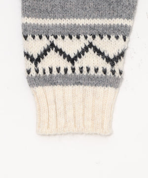 トライバル柄カウチンジップニット