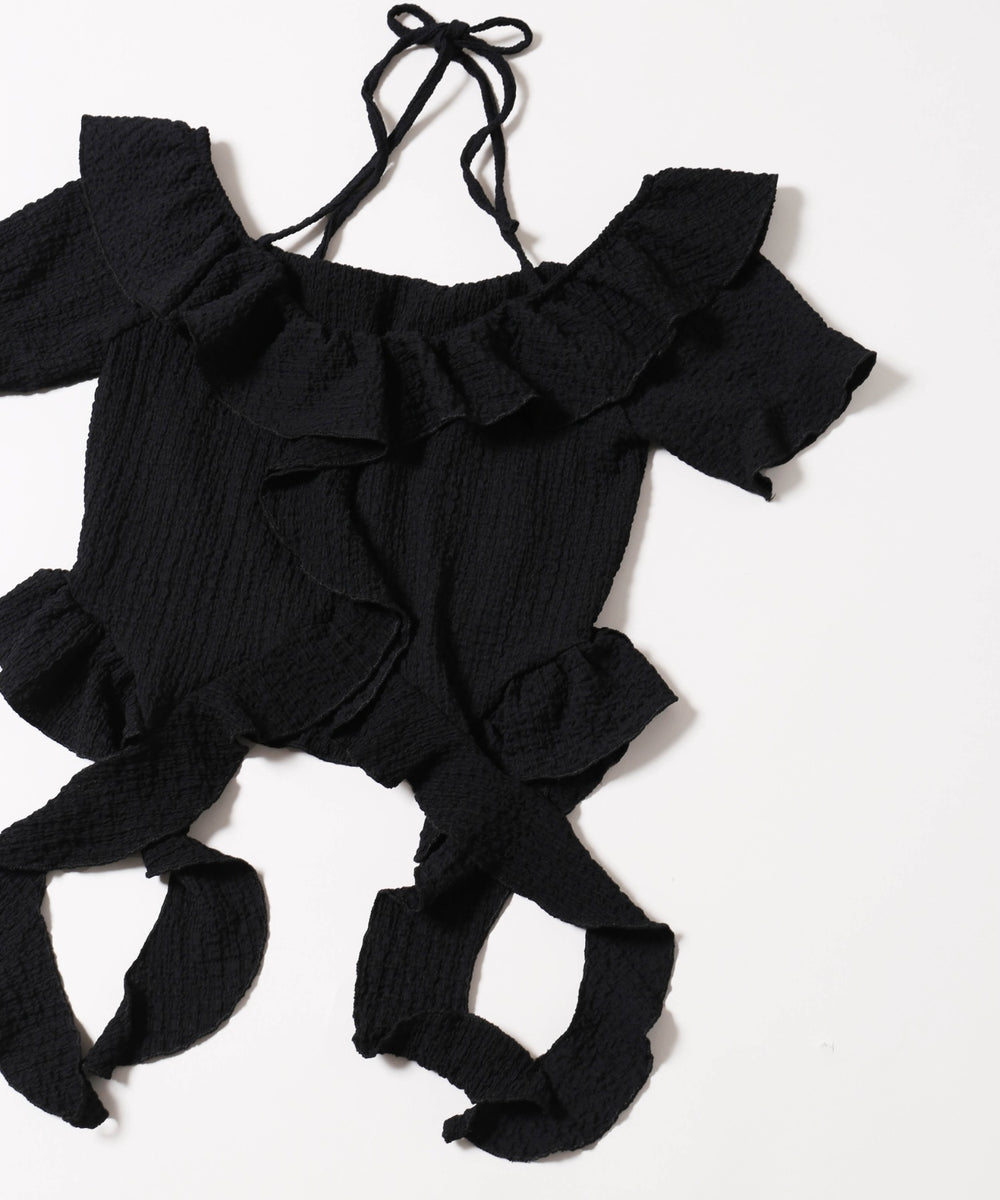 フリルイレヘムデザイントップス