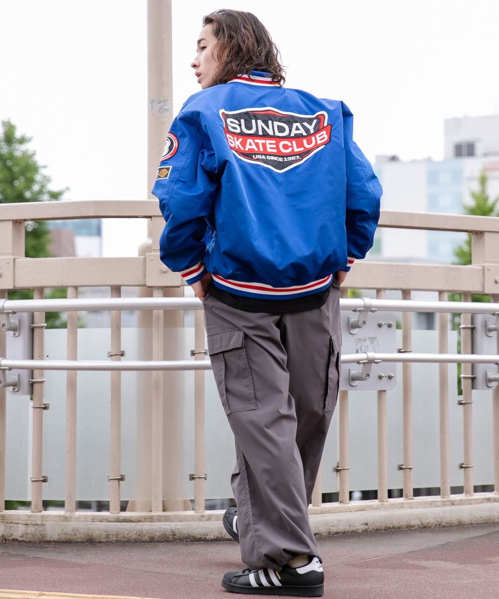 ブルー モデル：174cm M着用