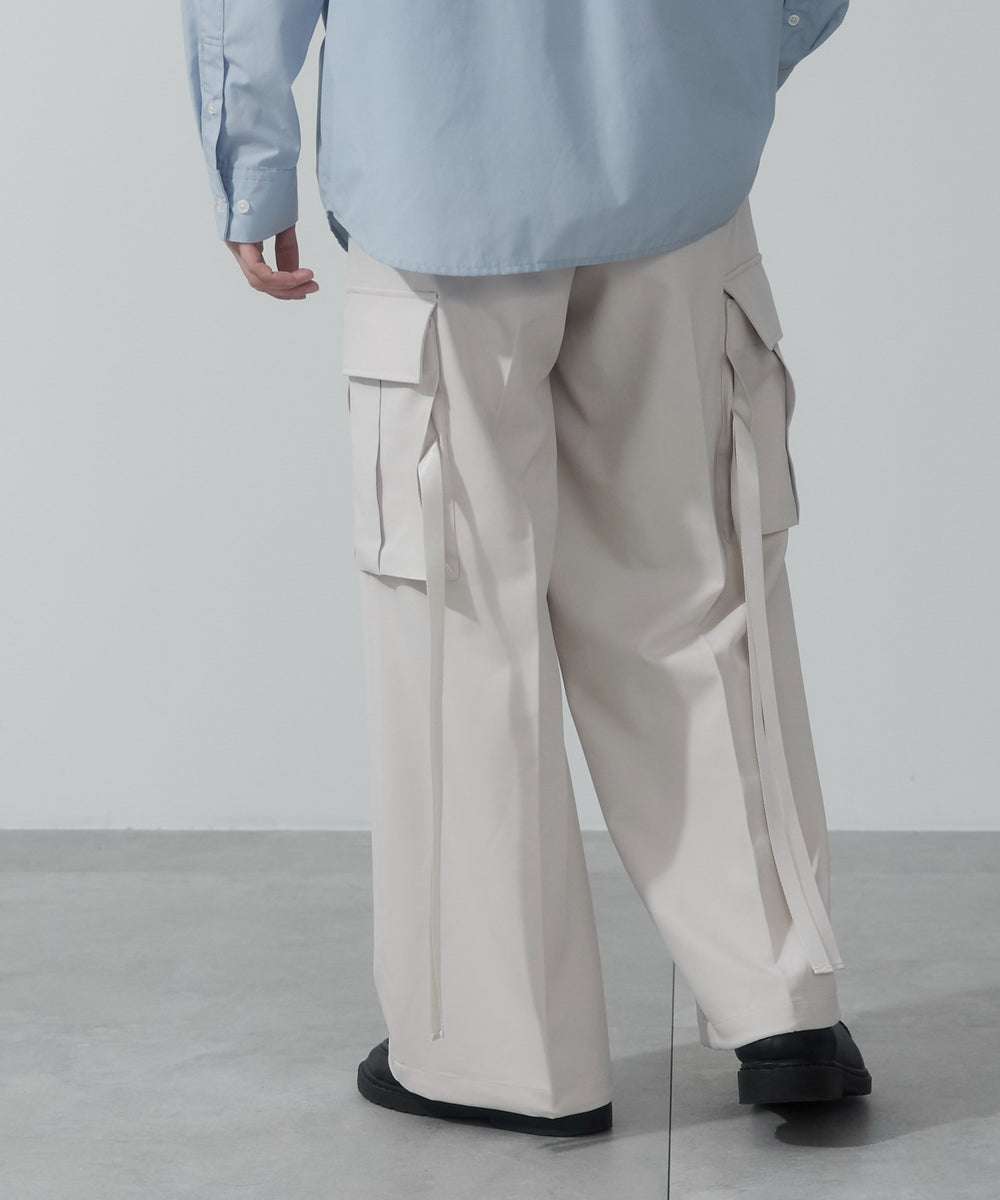 Lベージュ モデル：180cm L着用