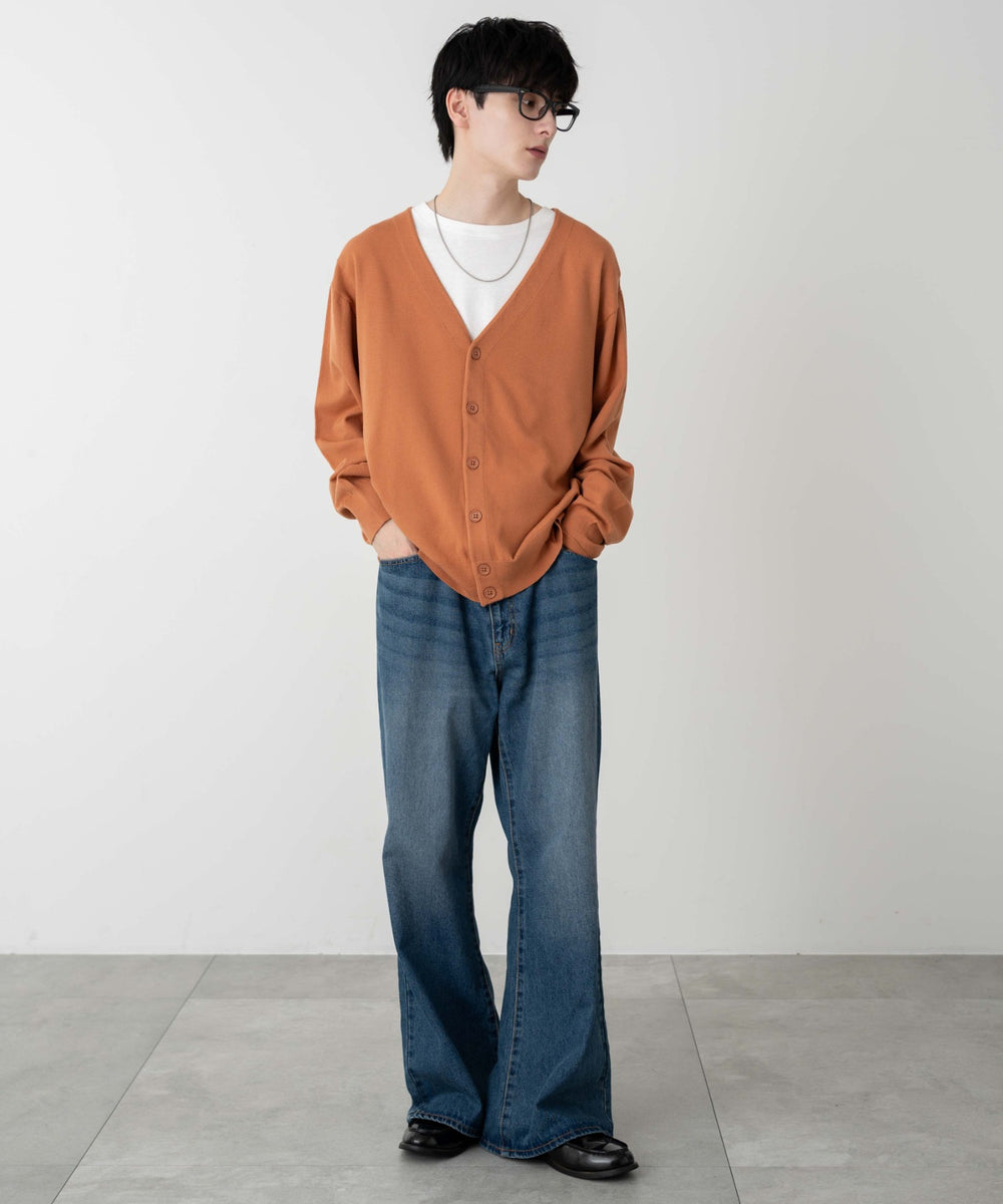 オレンジ モデル：177cm L着用