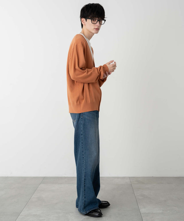 オレンジ モデル：177cm L着用