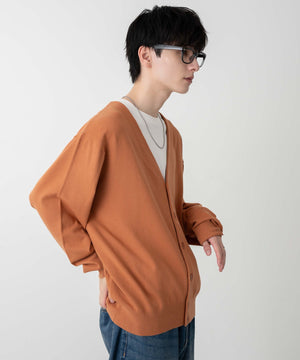 オレンジ モデル：177cm L着用