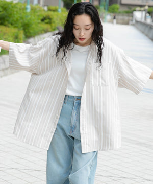 ベージュ モデル：161cm L着用