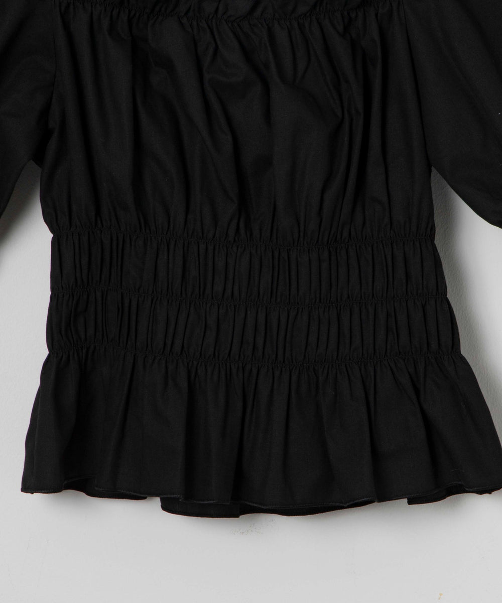 オフショルシャーリングブラウス