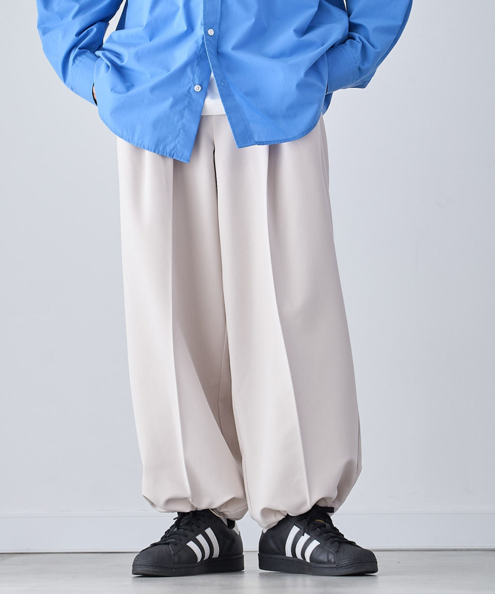 Lベージュ モデル：175cm L着用