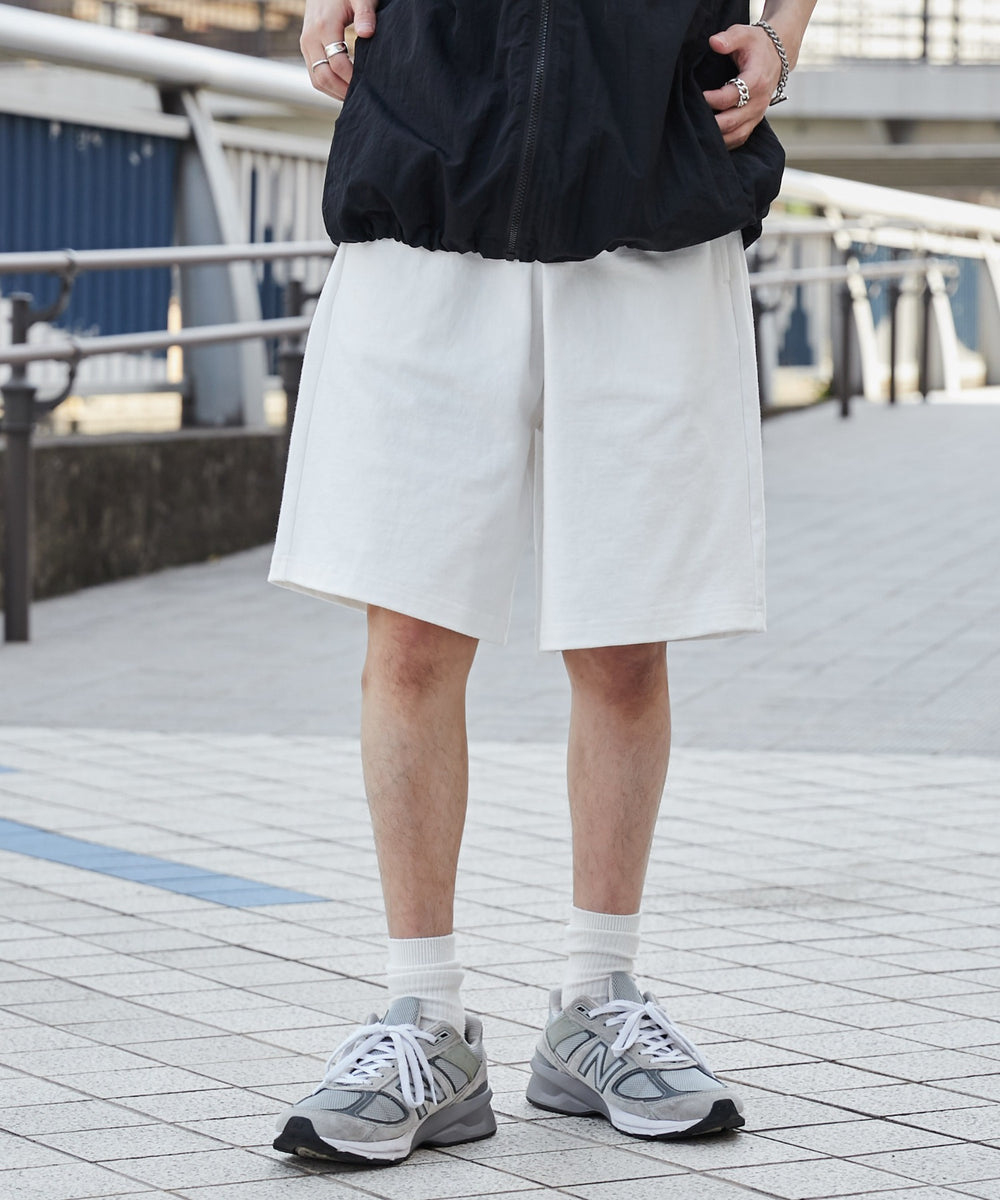 ホワイト モデル：173cm L着用