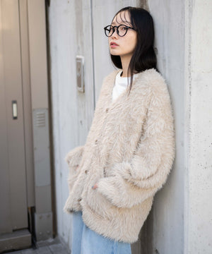 オフホワイト モデル：161cm L着用