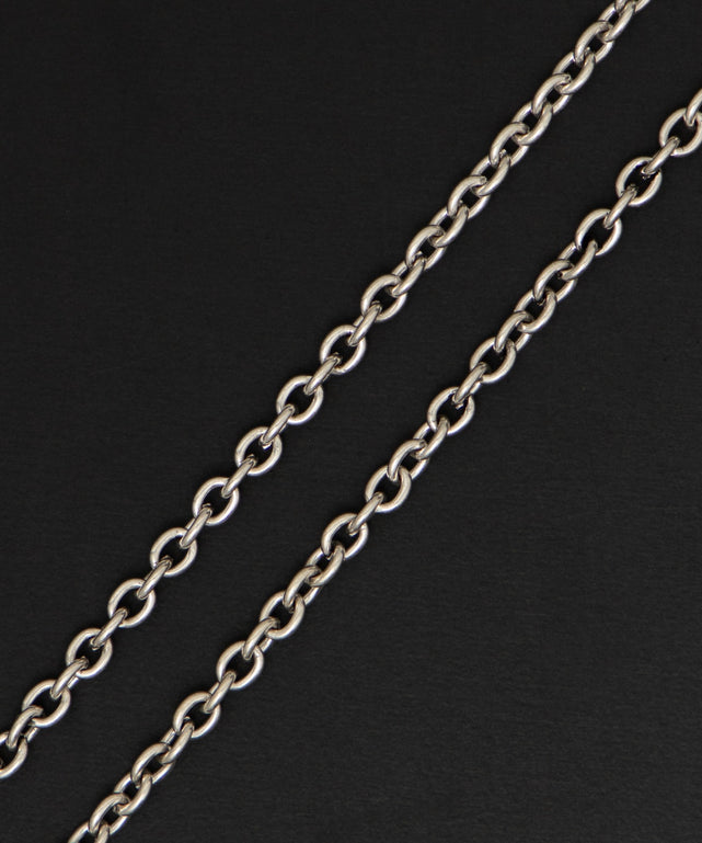 MPUエンボスロゴクロスネックレス