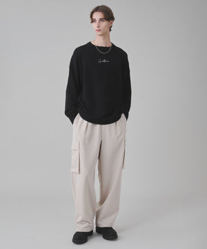 Lベージュ モデル：178cm L着用