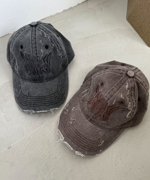 トライバルロゴダメージピグメントキャップ