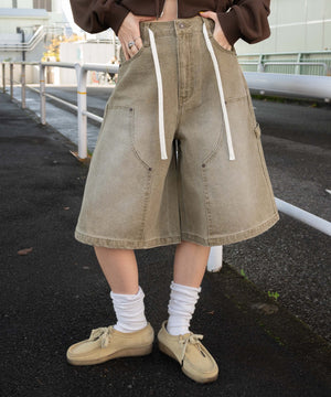 ダックベージュ モデル：155cm M着用