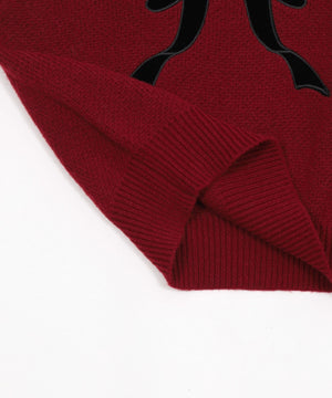 ベロアリボンアップリケタックスリーブニット