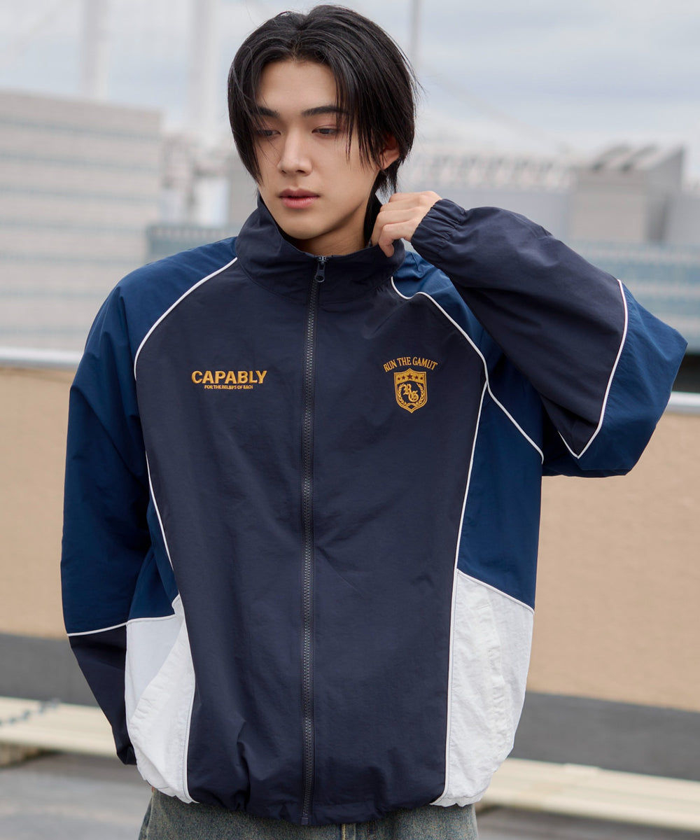 ネイビー モデル：175cm L着用