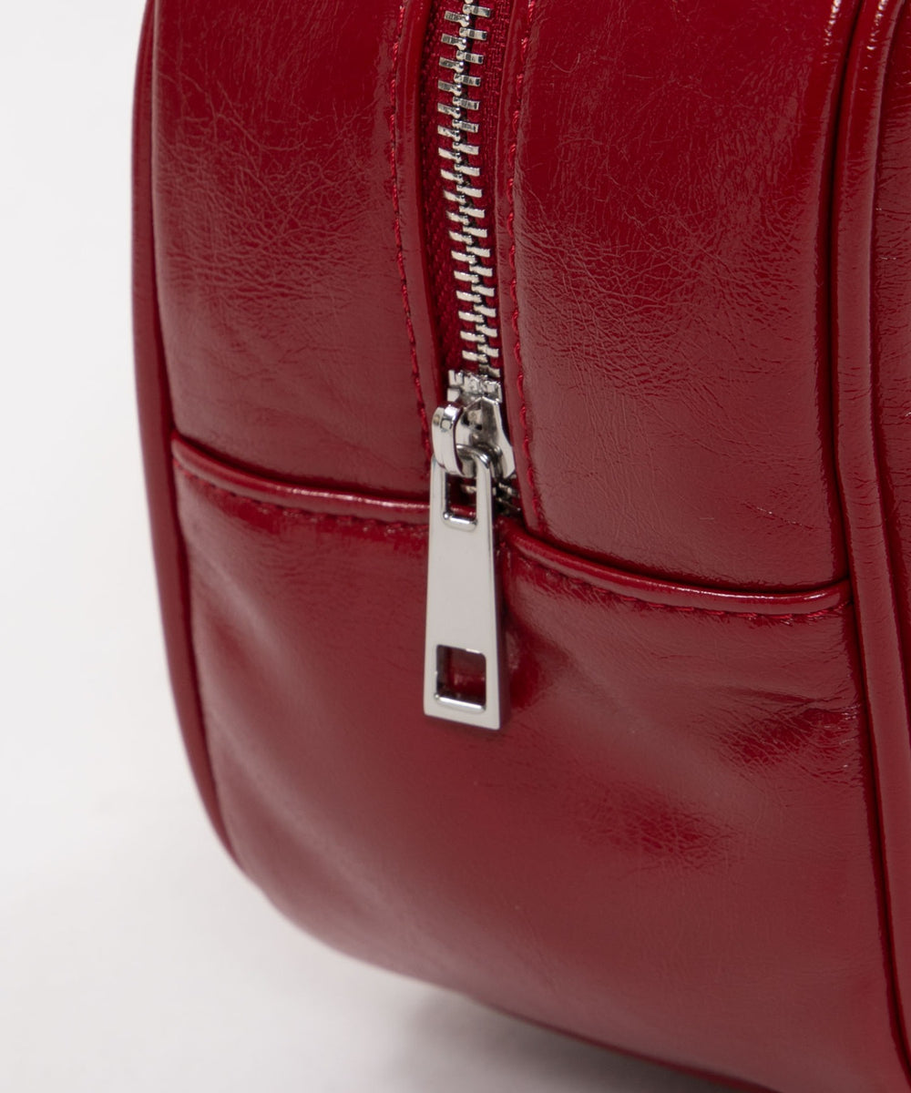 スタッズハートチャーム付きハトメボストン