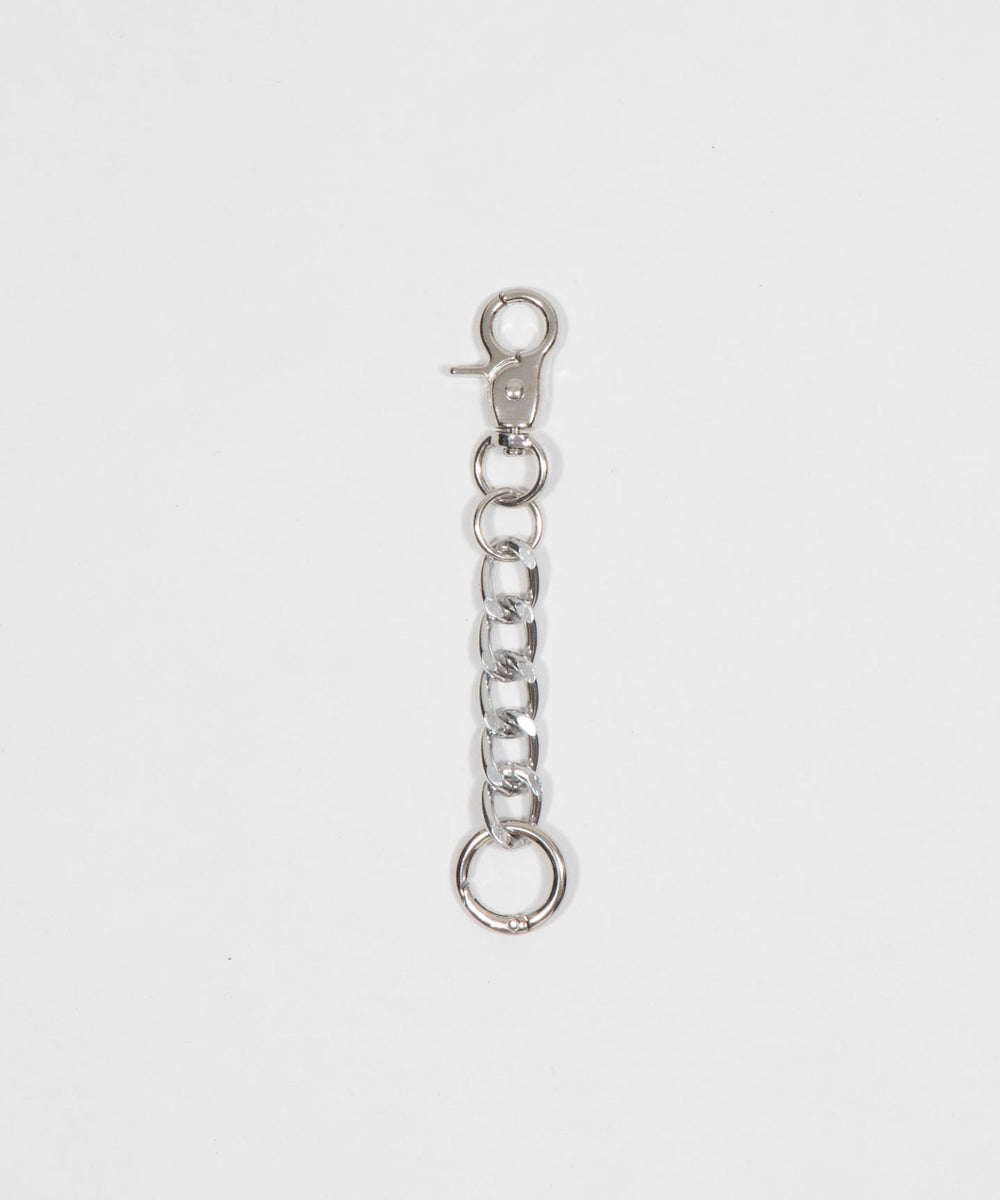 キーチャーム付きチノカーブパンツ