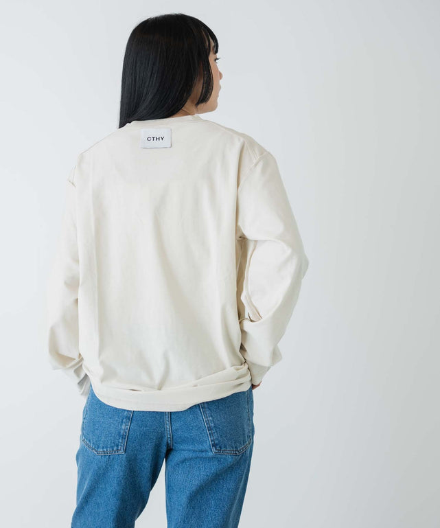 オフホワイト モデル：170cm M着用