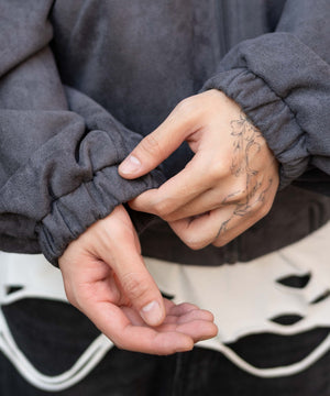 フェイクスウェードロゴスウィングトップ