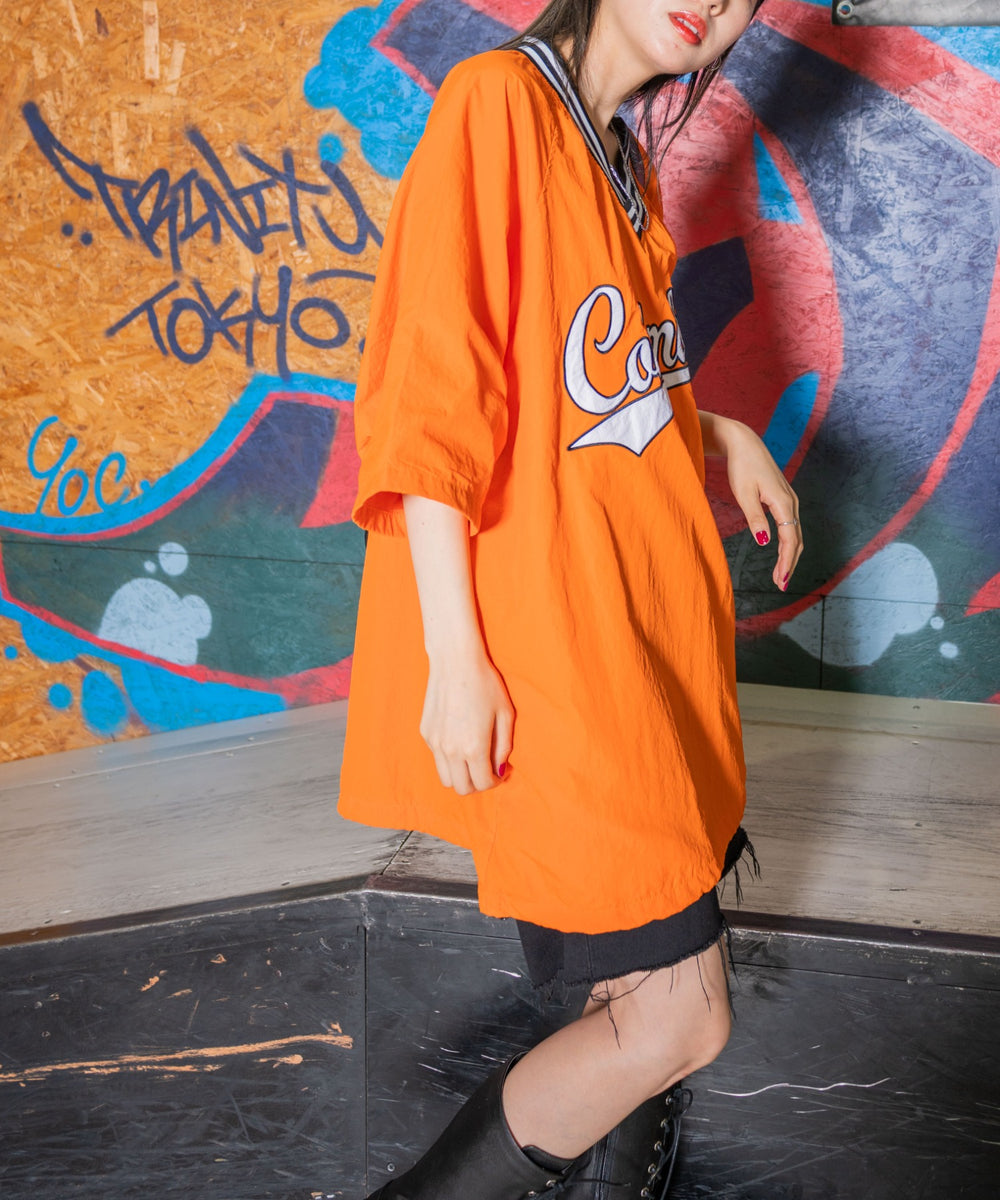 オレンジ モデル：154cm L着用