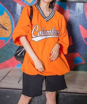 オレンジ モデル：154cm L着用